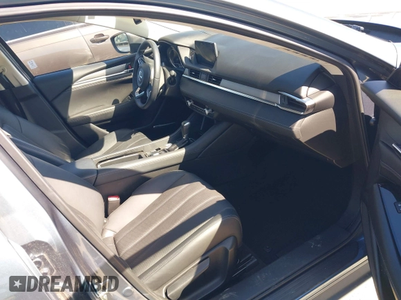 2018 Mazda 6 Grand Touring with VIN JM1GL1TY4J1333021, listed as a IAAI auction lot 41818719 with 56,188 mi miles and . Bid and sale history available at DreamBid. Image 5.