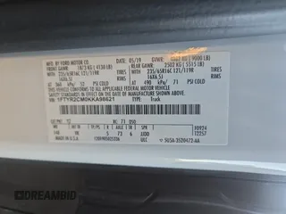 2019 Ford Transit with VIN 1FTYR2CM0KKA98621, listed as a Copart auction lot 60940125 with 77,075 mi miles and Salvage title. Bid and sale history available at DreamBid. Image 10.