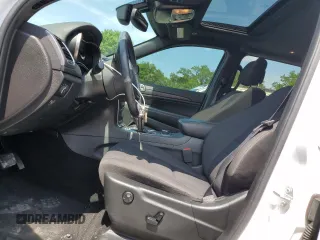 2019 Jeep Grand Cherokee Laredo E with VIN 1C4RJFAG8KC637464, listed as a Copart auction lot 60451115 with 102,105 mi miles and Salvage title. Bid and sale history available at DreamBid. Image 7.