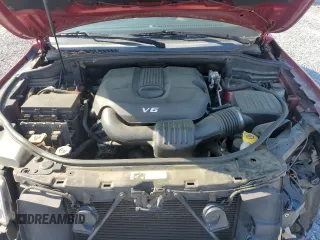 2014 Jeep Grand Cherokee Laredo with VIN 1C4RJEAG7EC274573, listed as a Copart auction lot 52637255 with 156,409 mi miles and Salvage Title. Bid and sale history available at DreamBid. Image 12.
