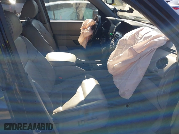 2013 Honda Pilot EX-L with VIN 5FNYF4H5XDB042112, listed as a IAAI auction lot 41989208 with 66,925 mi miles and . Bid and sale history available at DreamBid. Image 5.