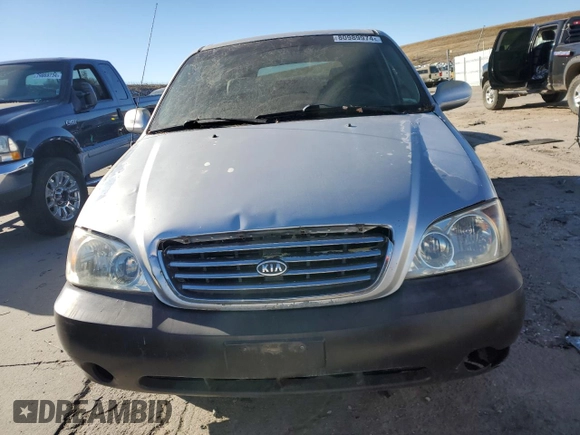 2003 Kia Sedona LX with VIN KNDUP131236371153, listed as a Copart auction lot 80989974 with 205,181 mi miles and Salvage Title. Bid and sale history available at carsss.com. Image 5.