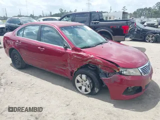 2010 Kia Optima LX z VIN KNAGG4A84A5370312, wystawiony jako IAAI lot #41962060 z przebiegiem 250 546 mil mil oraz . Historia ofert i sprzedaży dostępna na DreamBid. Obrazek 1.