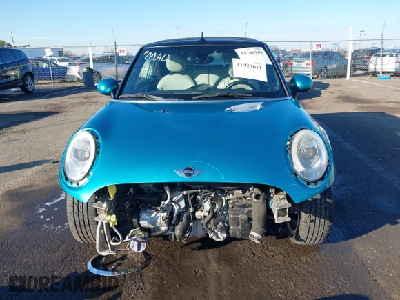 2016 MINI Convertible z VIN WMWWG5C50G3C19656, wystawiony jako IAAI lot #41429611 z przebiegiem 60 873 mil mil oraz . Historia ofert i sprzedaży dostępna na DreamBid. Obrazek 13.