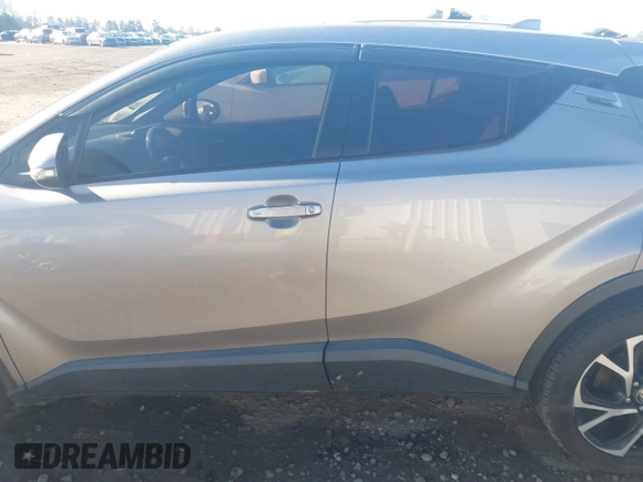 2018 Toyota C-HR XLE with VIN NMTKHMBX3JR048303, listed as a IAAI auction lot 41695246 with 125,081 mi miles. Bid and sale history available at carsss.com. Image 14.