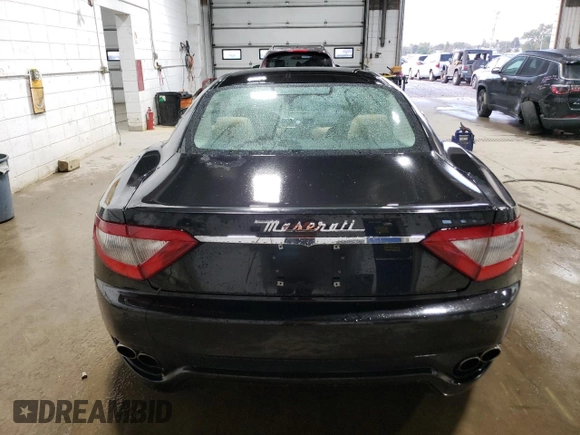 2009 Maserati GranTurismo с VIN ZAMGJ45A190042805, выставлен на аукционе Copart как лот 70785674 с пробегом 71 810 миль миль и Списание • Salvage title. История ставок и продаж доступна на DreamBid. Изображение 6.