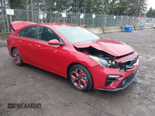 2021 Kia Forte LXS z VIN 3KPF24AD1ME268257, wystawiony jako IAAI lot #41868356 z przebiegiem 97 899 mil mil oraz . Historia ofert i sprzedaży dostępna na DreamBid. Obrazek 1.