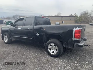 2014 Chevrolet Silverado 1500 LTZ with VIN 1GCVKSEC0EZ265504, listed as a IAAI auction lot 41737186 with 215,850 mi miles and . Bid and sale history available at DreamBid. Image 3.