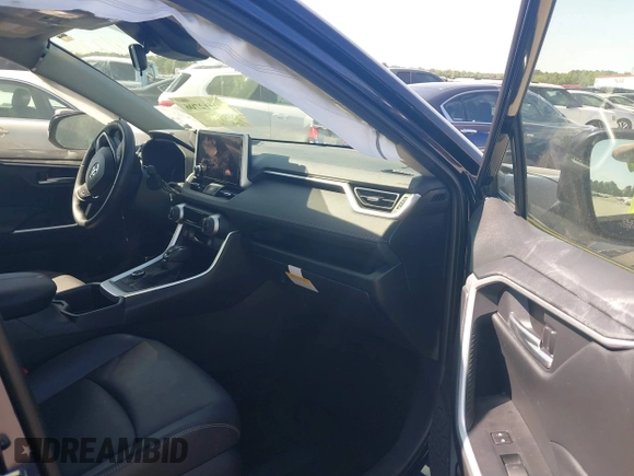 2023 Toyota RAV4 Hybrid XLE Premium with VIN JTMB6RFV4PD098886, listed as a IAAI auction lot 42112706 with 47,743 mi miles and . Bid and sale history available at DreamBid. Image 5.