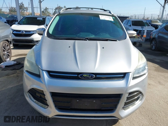 2015 Ford Escape Titanium with VIN 1FMCU0J90FUA43720, listed as a IAAI auction lot 42541048 with 98,948 mi miles and . Bid and sale history available at DreamBid. Image 12.