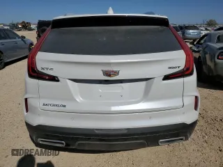 2024 Cadillac XT4 FWD Premium Luxury z VIN 1GYFZCR44RF239840, wystawiony jako Copart lot #48870445 z przebiegiem 5 276 mil mil oraz Szkoda całkowita • Salvage title. Historia ofert i sprzedaży dostępna na DreamBid. Obrazek 6.