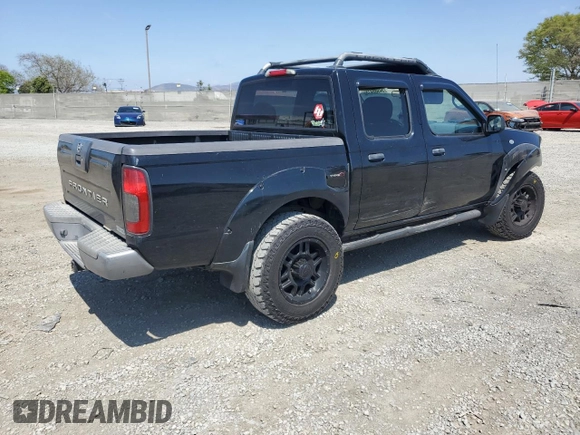 2004 Nissan Frontier XE with VIN 1N6ED27T84C446811, listed as a Copart auction lot 54988415 with 172,655 mi miles and Salvage title. Bid and sale history available at DreamBid. Image 3.