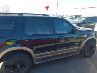 2002 Ford Explorer Eddie Bauer z VIN 1FMDU74W82ZC83464, wystawiony jako IAAI lot #41652672 z przebiegiem 145 151 mil mil oraz . Historia ofert i sprzedaży dostępna na DreamBid. Obrazek 13.
