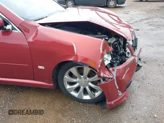 2006 Infiniti M z VIN JNKAY01E96M106728, wystawiony jako IAAI lot #42072634 z przebiegiem 138 275 mil mil oraz . Historia ofert i sprzedaży dostępna na DreamBid. Obrazek 13.