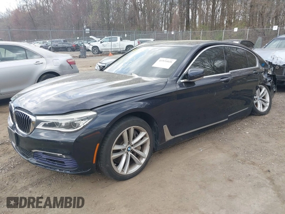 2016 BMW 7 Series 750i xDrive with VIN WBA7F2C58GG418482, listed as a IAAI auction lot 41931831 with 97,776 mi miles and . Bid and sale history available at DreamBid. Image 2.