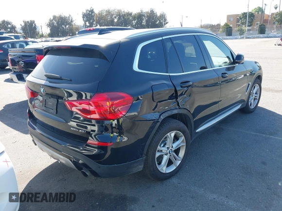 2019 BMW X3 sDrive30i with VIN 5UXTR7C5XKLR51471, listed as a IAAI auction lot 41718818 with 52,670 mi miles. Bid and sale history available at carsss.com. Image 4.