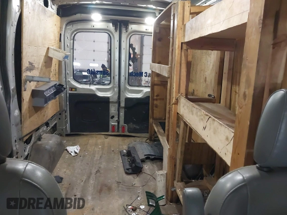 2015 Ford Transit Cargo with VIN 1FTNR1CM6FKA19083, listed as a IAAI auction lot 41790045 with 56,762 mi miles and . Bid and sale history available at carsss.com. Image 17.