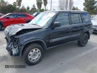 2000 Honda CR-V LX with VIN JHLRD1846YS018661, listed as a IAAI auction lot 41900498 with 197,668 mi miles. Bid and sale history available at carsss.com. Image 2.