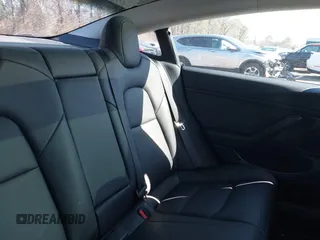 2020 Tesla Model 3 Standard Range Plus with VIN 5YJ3E1EA0LF783672, listed as a IAAI auction lot 41903431 with 52,157 mi miles and . Bid and sale history available at carsss.com. Image 8.