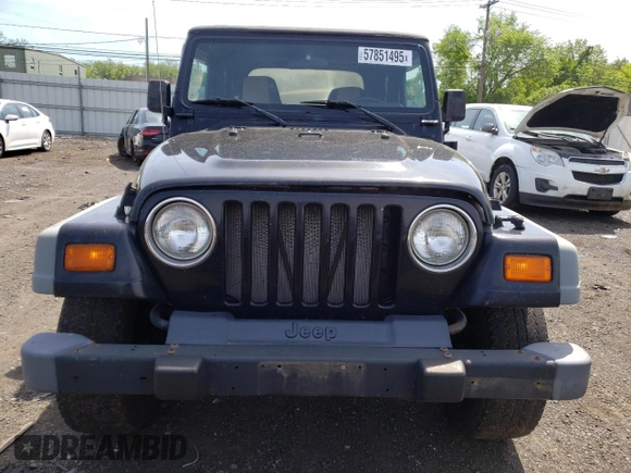 2002 Jeep Wrangler X with VIN 1J4FA39S12P759967, listed as a Copart auction lot 57851495 with 178,035 mi miles and Salvage title. Bid and sale history available at DreamBid. Image 5.