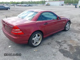 2000 Mercedes-Benz SLK 230 Kompressor with VIN WDBKK47F2YF146797, listed as a IAAI auction lot 42823113 with 35,881 mi miles and . Bid and sale history available at DreamBid. Image 4.