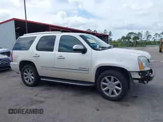 2009 GMC Yukon Denali z VIN 1GKFK032X9R236556, wystawiony jako IAAI lot #40805429 z przebiegiem 183 042 mil mil oraz . Historia ofert i sprzedaży dostępna na DreamBid. Obrazek 13.