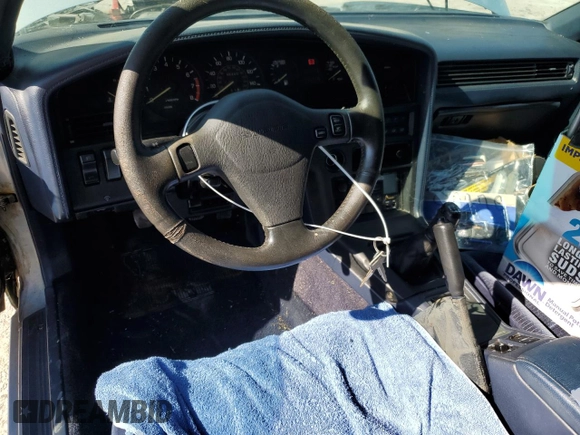 1989 Toyota Supra z VIN JT2MA70J8K0114002, wystawiony jako Copart lot #78068714 z przebiegiem 196 448 mil mil oraz Czysty tytuł • Clean title. Historia ofert i sprzedaży dostępna na DreamBid. Obrazek 8.