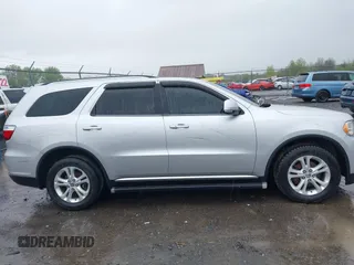 2012 Dodge Durango Crew with VIN 1C4RDJDG0CC322388, listed as a IAAI auction lot 42179814 with 124,009 mi miles and . Bid and sale history available at carsss.com. Image 13.