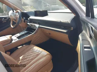 2022 Genesis GV80 with VIN KMUHCESC6NU084725, listed as a IAAI auction lot 42423446 with 66,562 mi miles and . Bid and sale history available at DreamBid. Image 5.