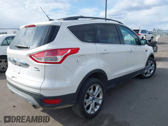 2013 Ford Escape SEL with VIN 1FMCU9H90DUD84350, listed as a IAAI auction lot 41883888 with 177,347 mi miles. Bid and sale history available at carsss.com. Image 4.
