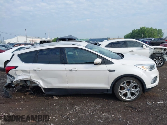 2019 Ford Escape Titanium with VIN 1FMCU9J97KUA03195, listed as a IAAI auction lot 42656589 with 40,099 mi miles and . Bid and sale history available at DreamBid. Image 13.