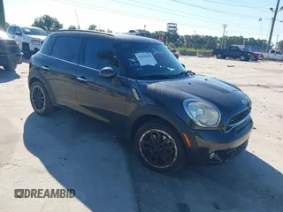 2015 MINI Countryman S with VIN WMWZC3C58FWT04316, listed as a IAAI auction lot 42525698 with 97,046 mi miles and . Bid and sale history available at DreamBid. Image 1.