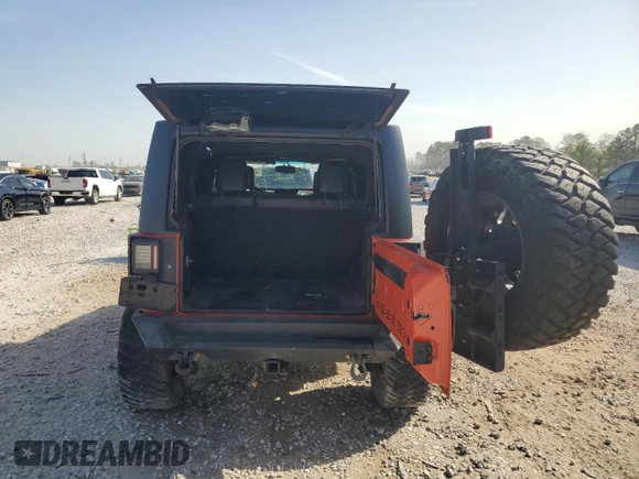 2015 Jeep Wrangler Unlimited Rubicon Hard Rock z VIN 1C4HJWFG7FL690098, wystawiony jako Copart lot #47431555 z przebiegiem 95 138 mil mil oraz Szkoda całkowita • Salvage title. Historia ofert i sprzedaży dostępna na DreamBid. Obrazek 6.