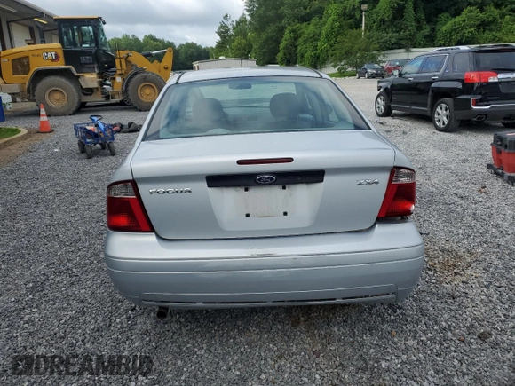2005 Ford Focus S with VIN 1FAFP34N55W115653, listed as a Copart auction lot 63043315 with 110,593 mi miles and Salvage title. Bid and sale history available at DreamBid. Image 6.