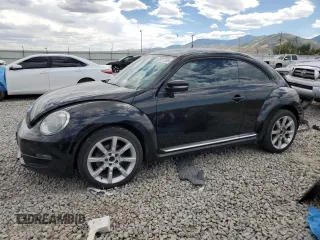 2013 Volkswagen Beetle 2.5L w/Sun with VIN 3VWJP7AT4DM607911, listed as a Copart auction lot 63877205 with 150,463 mi miles and Salvage title. Bid and sale history available at DreamBid. Image 1.