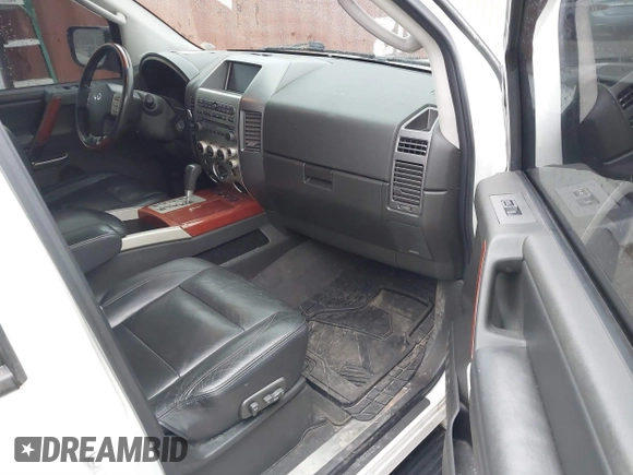 2007 Infiniti QX56 with VIN 5N3AA08A17N802779, listed as a IAAI auction lot 41461156 with 148,006 mi miles. Bid and sale history available at carsss.com. Image 5.