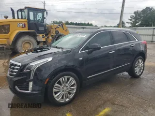 2019 Cadillac XT5 Premium Luxury FWD with VIN 1GYKNERS2KZ267340, listed as a Copart auction lot 56110645 with 122,624 mi miles and Salvage title. Bid and sale history available at DreamBid. Image 1.