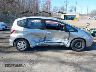 2013 Honda Fit with VIN JHMGE8H38DC048569, listed as a IAAI auction lot 41898777 with 130,461 mi miles. Bid and sale history available at carsss.com. Image 13.