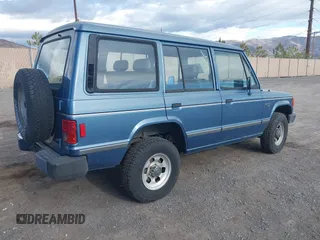 1991 Mitsubishi Montero z VIN JA4GJ31S0MJ006906, wystawiony jako IAAI lot #41782268 z przebiegiem 184 605 mil mil oraz . Historia ofert i sprzedaży dostępna na DreamBid. Obrazek 4.