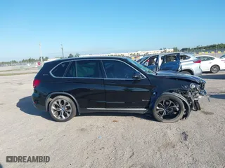 2018 BMW X5 xDrive40e iPerformance with VIN 5UXKT0C59J0W00801, listed as a IAAI auction lot 41081133 with 63,265 mi miles. Bid and sale history available at carsss.com. Image 14.