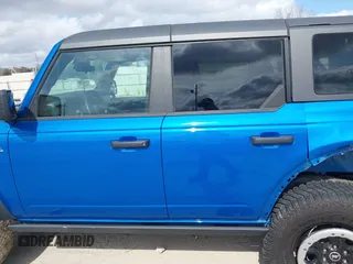 2023 Ford Bronco z VIN 1FMEE5DH6PLB09202, wystawiony jako IAAI lot #41059734 z przebiegiem 30 186 mil mil oraz . Historia ofert i sprzedaży dostępna na DreamBid. Obrazek 14.