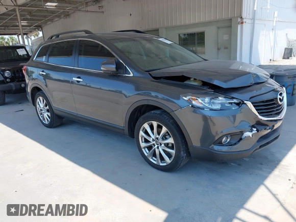2014 Mazda CX-9 Grand Touring z VIN JM3TB2DA0E0434181, wystawiony jako IAAI lot #42295436 z przebiegiem 78 372 mil mil oraz . Historia ofert i sprzedaży dostępna na DreamBid. Obrazek 1.