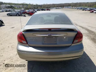 2001 Ford Taurus SES with VIN 1FAFP55U71A232899, listed as a Copart auction lot 53276665 with 129,347 mi miles and Salvage Title. Bid and sale history available at carsss.com. Image 6.