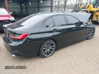 2019 BMW 3 Series 330i xDrive with VIN WBA5R7C52KAJ87697, listed as a IAAI auction lot 41795207 with 53,760 mi miles. Bid and sale history available at carsss.com. Image 4.