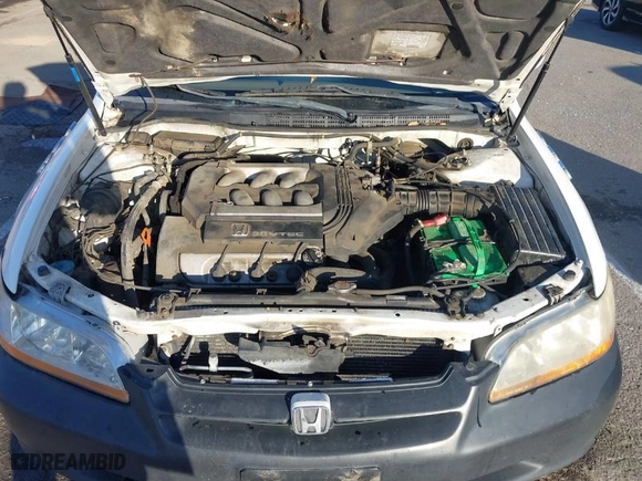 1999 Honda Accord Sdn EX with VIN 1HGCG1659XA049897, listed as a IAAI auction lot 41674942 with 194878 miles. Bid and sale history available at carsss.com. Image 10.