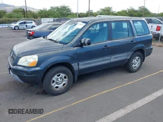 2004 Honda Pilot LX with VIN 2HKYF18114H591405, listed as a IAAI auction lot 42386073 with 71,295 mi miles and . Bid and sale history available at DreamBid. Image 2.