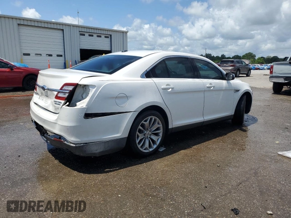 2014 Ford Taurus Limited с VIN 1FAHP2F89EG120939, выставлен на аукционе Copart как лот 59204815 с пробегом 180 105 миль миль и Списание • Salvage title. История ставок и продаж доступна на DreamBid. Изображение 3.