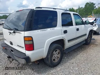 2005 Chevrolet Tahoe LT z VIN 1GNEC13T15J198864, wystawiony jako IAAI lot #42306809 z przebiegiem 317 907 mil mil oraz . Historia ofert i sprzedaży dostępna na DreamBid. Obrazek 4.