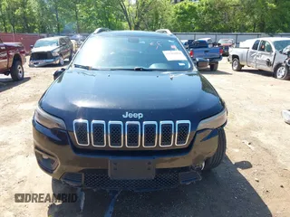2019 Jeep Cherokee Latitude Plus z VIN 1C4PJLLBXKD123116, wystawiony jako IAAI lot #41981044 z przebiegiem 173 232 mil mil oraz . Historia ofert i sprzedaży dostępna na DreamBid. Obrazek 13.