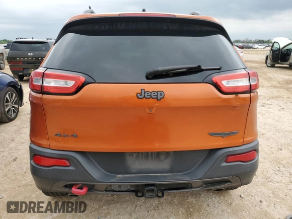 2015 Jeep Cherokee Trailhawk with VIN 1C4PJMBSXFW757382, listed as a Copart auction lot 53566885 with 139,972 mi miles and Clean Title. Bid and sale history available at carsss.com. Image 6.